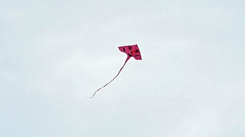 Low angle view of flag against clear sky