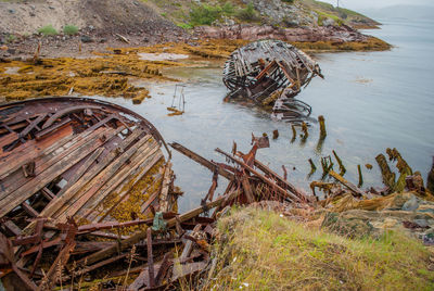 High angle view of abandoned boats on beach