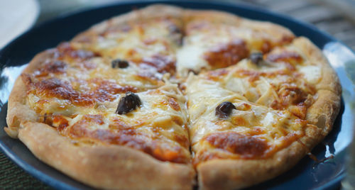 Close-up of pizza on plate