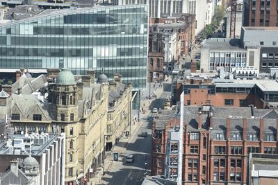 High angle view of street amidst buildings in city