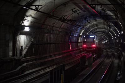 Train on illuminated railroad tracks