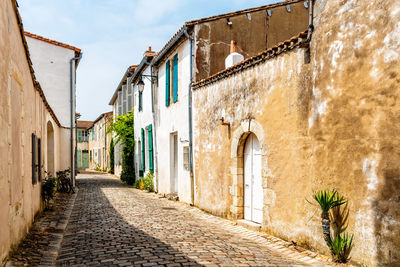 Picturesque street with traditional old houses in saint martin de re. island of re