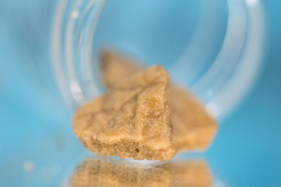 Close-up of cannabis dabs in mason jar on table