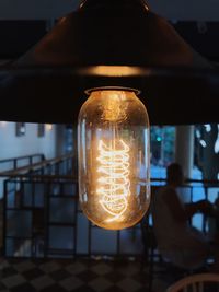 Close-up of illuminated lighting equipment