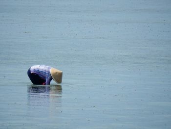 Man fishing in lake