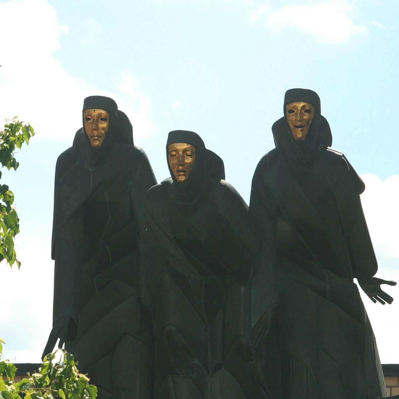 LOW ANGLE VIEW OF PEOPLE ON WALL