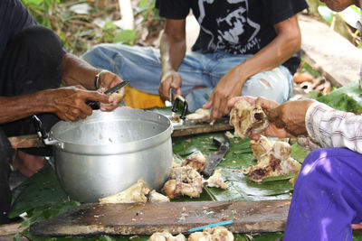 Group of people preparing food