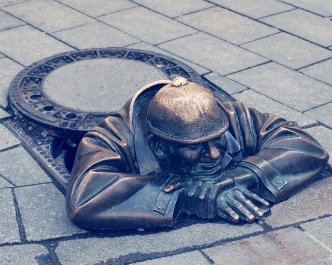 shoe, high angle view, cobblestone, street, paving stone, footwear, low section, sidewalk, footpath, day, pair, outdoors, tiled floor, pavement, flooring, no people, sunlight, close-up, person, transportation