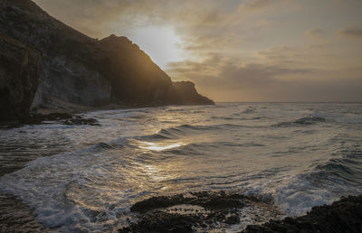 Scenic view of sea in cabo de gata nature park, spain, against sky during sunrise