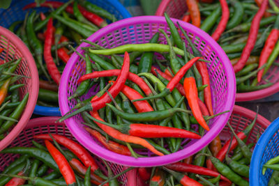 Chili peppers in baskets for sale