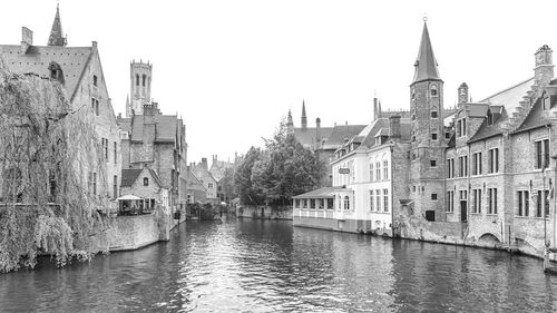 View of canal with buildings in background