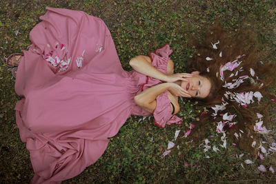 High angle view of woman standing on field