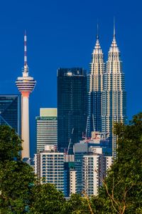 Low angle view of skyscrapers against sky