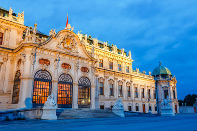 Facade of historic building against blue sky