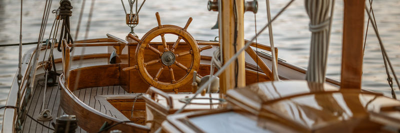 Close-up of sailboat in sea