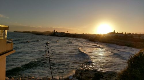 Scenic view of sea against sky during sunset