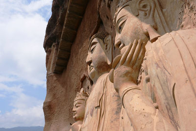 Low angle view of buddha statue