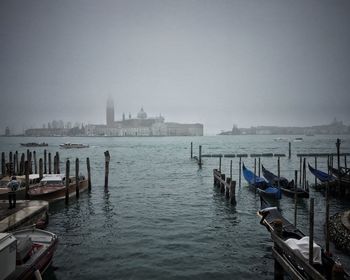 View of boats in city