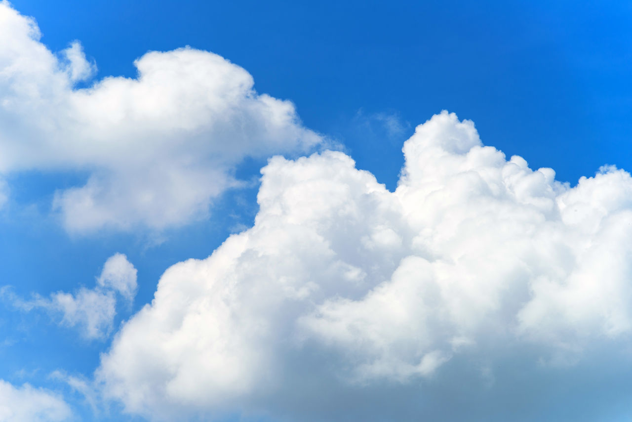 LOW ANGLE VIEW OF CLOUDS AGAINST BLUE SKY