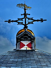 Low angle view of building against blue sky