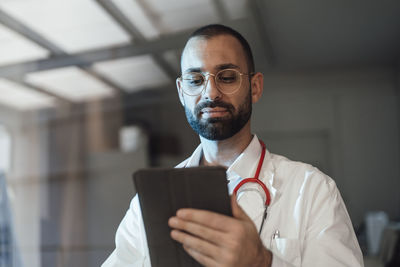 Doctor using tablet pc in hospital