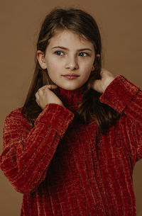 Portrait of a beautiful young woman with red eyes