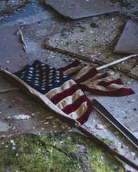 High angle view of old abandoned american flag