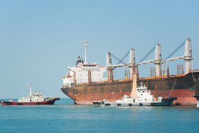 Ship in sea against clear sky