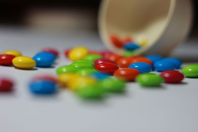 Close-up of multi colored balls on table