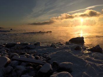 Scenic view of sunset over sea