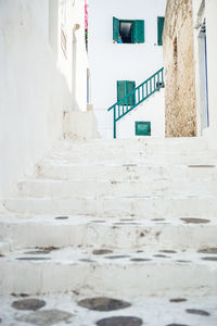 Staircase leading towards building during winter