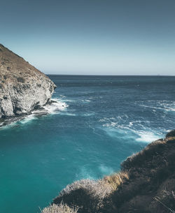 Scenic view of sea against clear sky