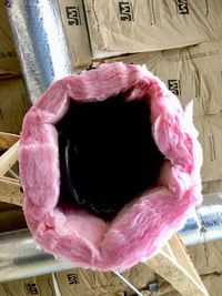 High angle view of pink apple on table