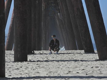 Man sitting on wall