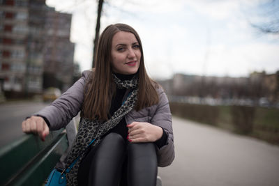 Portrait of beautiful woman in car
