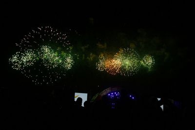 Firework display at night