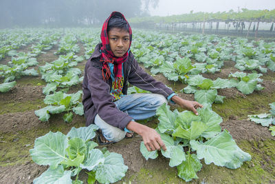 Portrait of teenage girl in farm