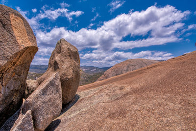 Scenic view of rocky mountains against sky