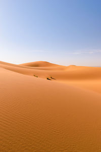 View of desert against clear sky