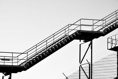 Low angle view of steps against clear sky