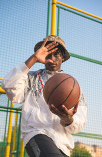 Portrait of the black man with the basketball