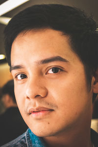 Close-up portrait of young man