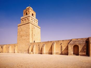 Back wall and tower of the oldest mosque in north africa, kairouan, tunisia