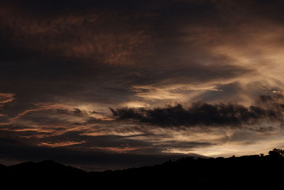 Scenic view of dramatic sky during sunset