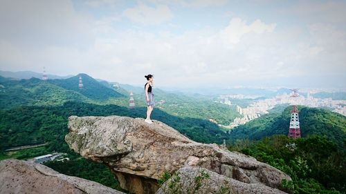 Man standing on rock formation