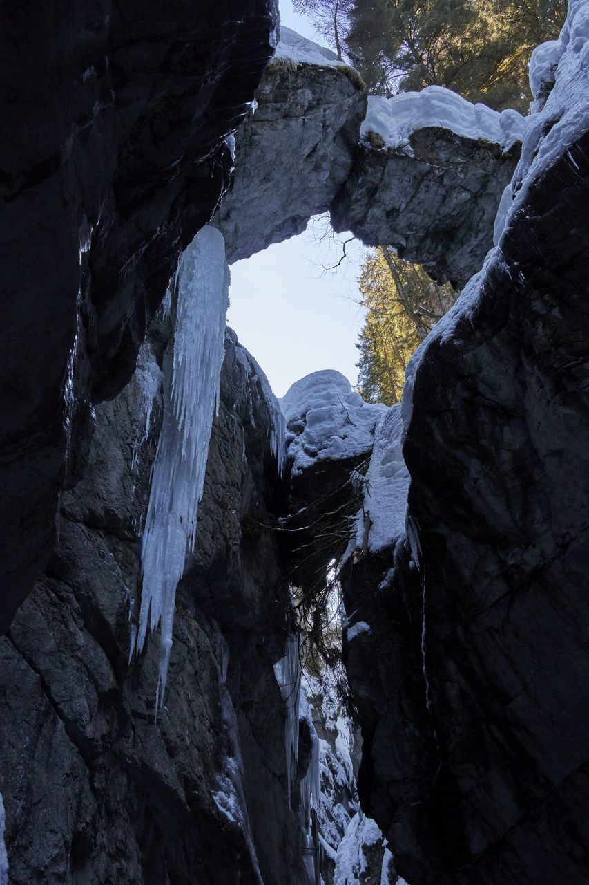 LOW ANGLE VIEW OF ICICLES ROCK FORMATION