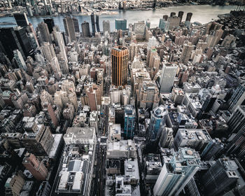 High angle view of crowd and buildings in city