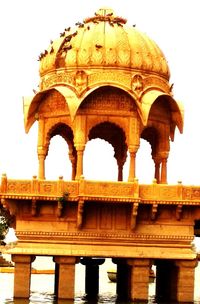 Low angle view of historic building against clear sky