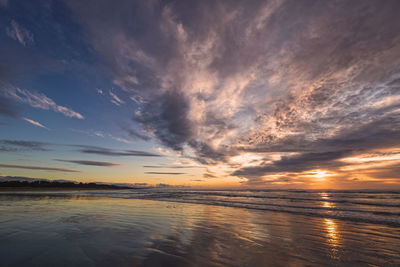 Scenic view of sea against sky at sunset