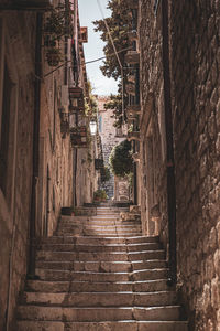 Staircase amidst buildings